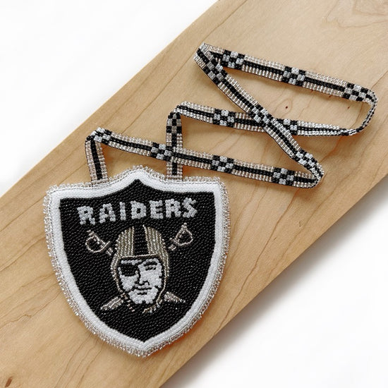 Raiders beaded medallion